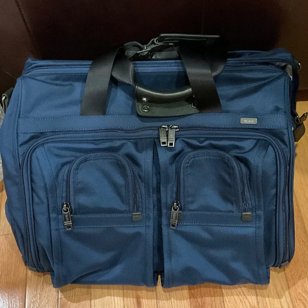 Tumi alpha deluxe carry on satchel in navy blue